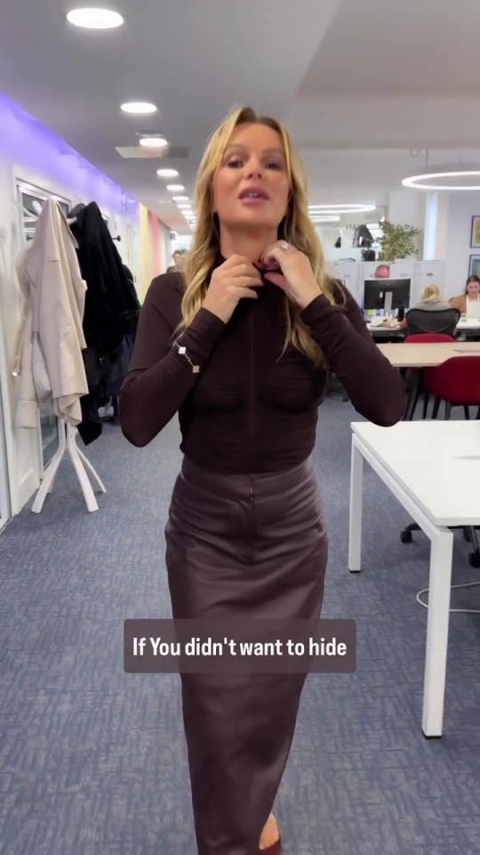 a woman in a brown leather skirt is standing in an office with the caption if you did n't want to hide