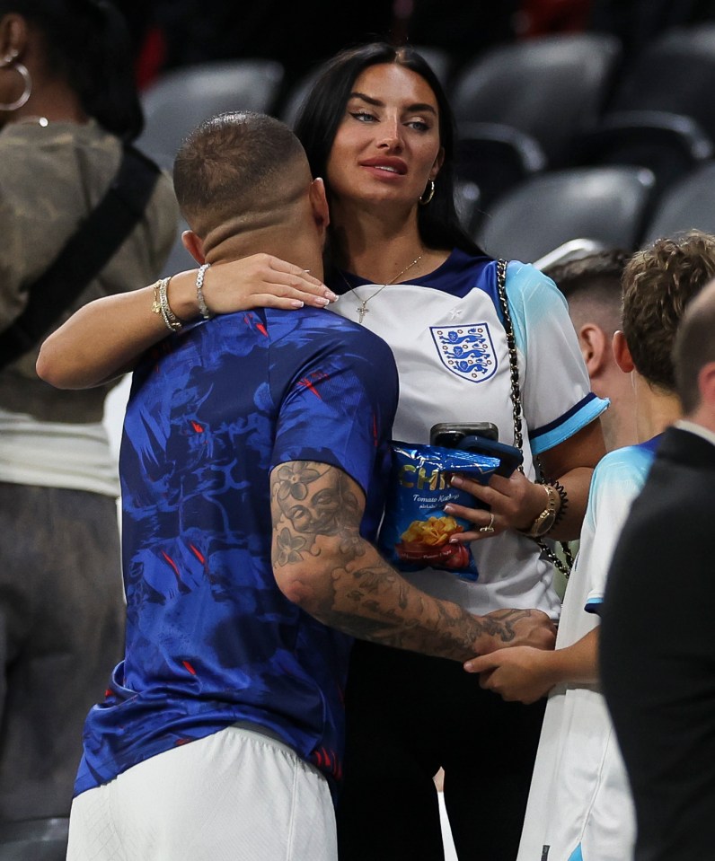 a man in a blue shirt that says ' england ' on it