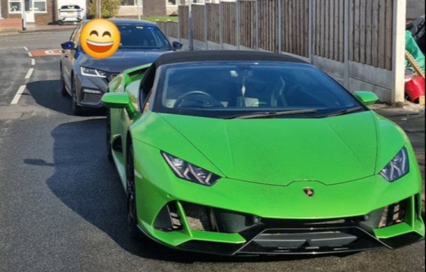 a green lamborghini is parked on the side of the road