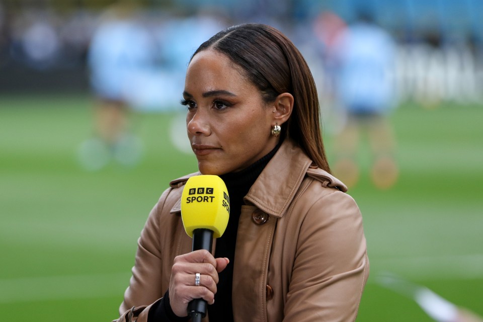 a woman holding a microphone that says bbc sport