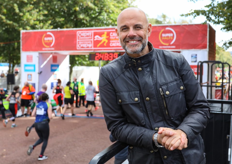 BBC presenter Jason Mohammad enjoys watching the Cardiff Half Marathon on October 6, 2019