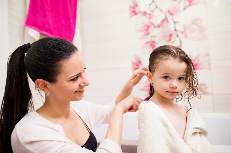 Responses to the post advised Kaylee to spray water mixed with conditioner on her daughter's hair before brushing it (stock image)