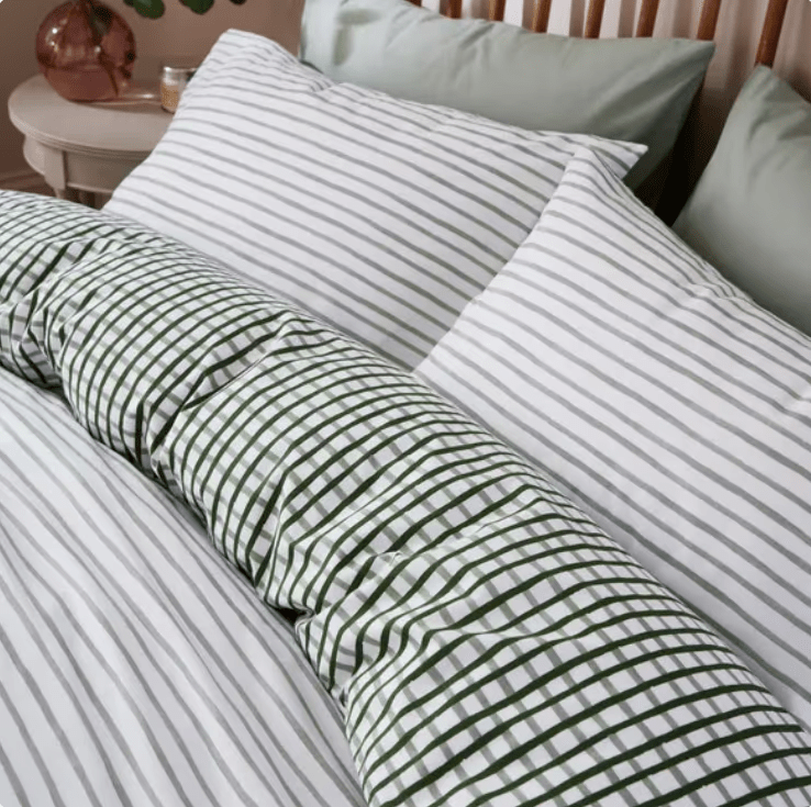 The 100 per cent cotton duvet set has a striped print on one side and a gingham pattern on the other