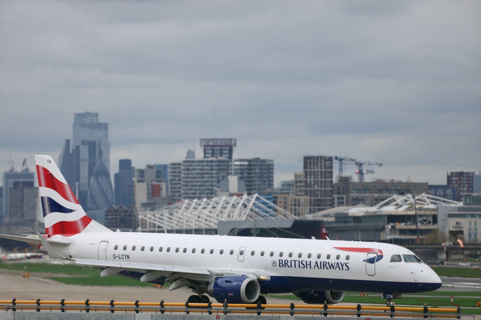 a british airways plane is taking off from an airport