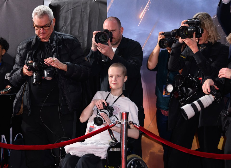 Liz was snapping stars at the London premiere of Tom Hardy movie Venom on Wednesday