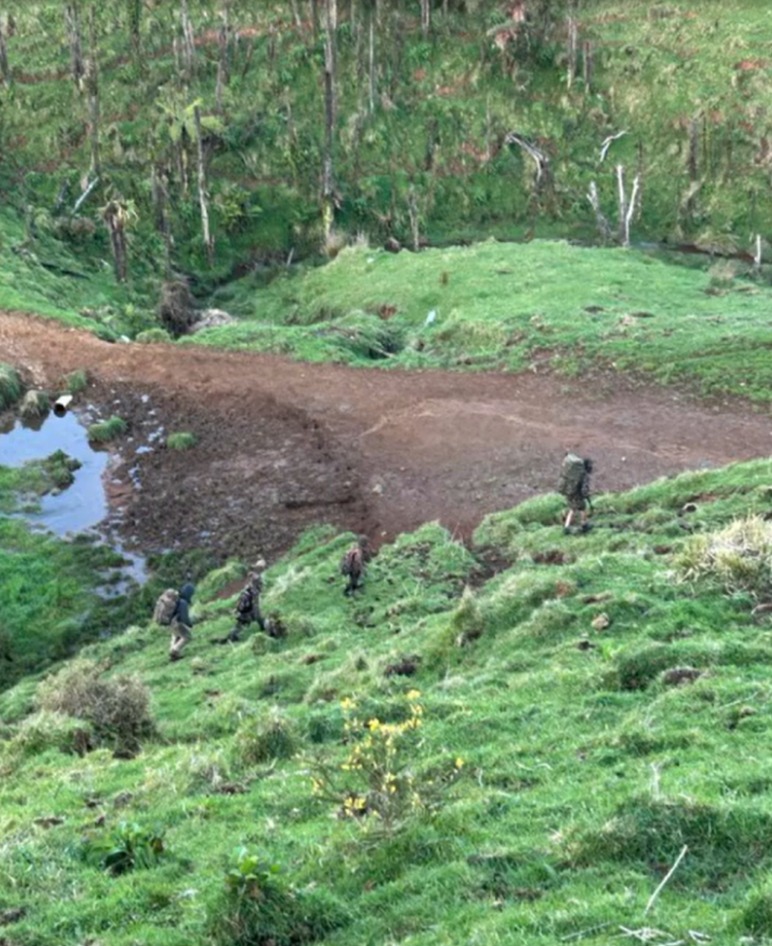 New footage shows Phillips trekking along with his children in a remote location