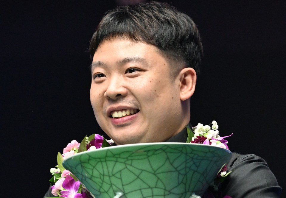 Mandatory Credit: Photo by Xinhua/Shutterstock (14206188p) Zhang Anda celebrates with the trophy after the final between Zhang Anda of China and Tom Ford of England at World Snooker International Championship 2023 in north China's Tianjin Municipality, Nov. 12, 2023. China Tianjin Snooker International Championship - 12 Nov 2023