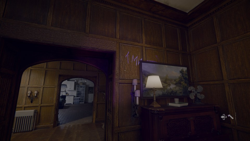 a dark room with a painting on the wall that says 1m