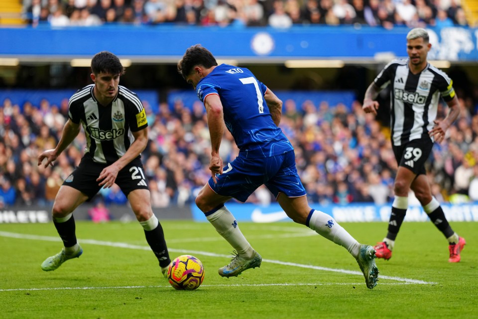 a soccer player with the number 1 on his shorts