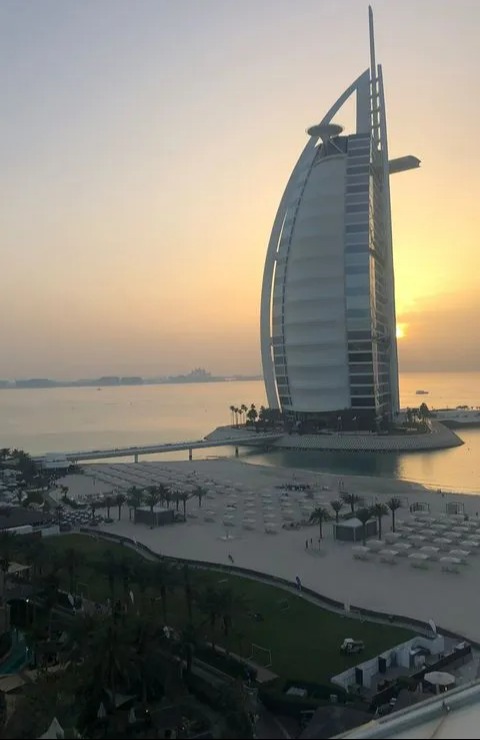 a view of the burj khalifa at sunset