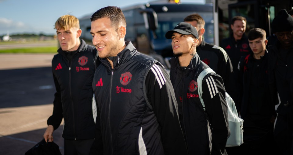 a group of soccer players are wearing adidas jackets