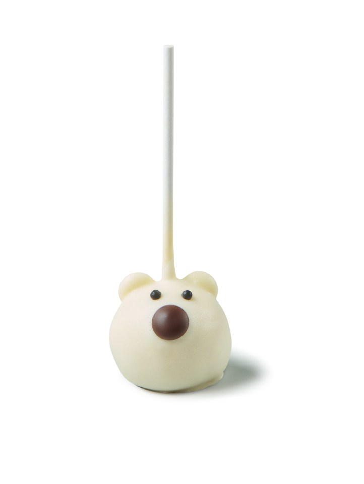 a white cake pop in the shape of a polar bear