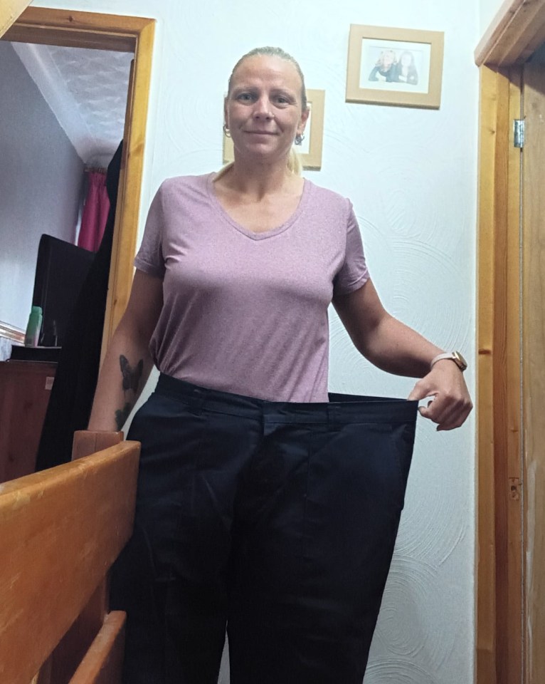 The mum showing off her new, slim waist