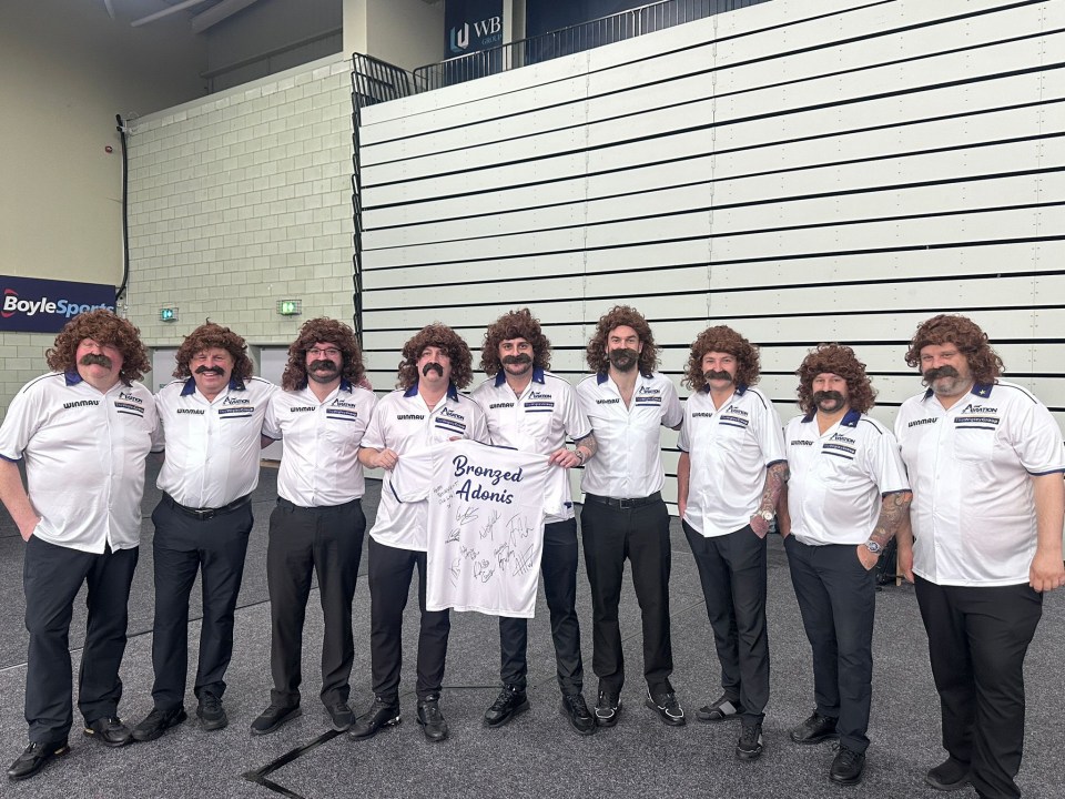 a group of men wearing wigs and shirts that say grunged adams