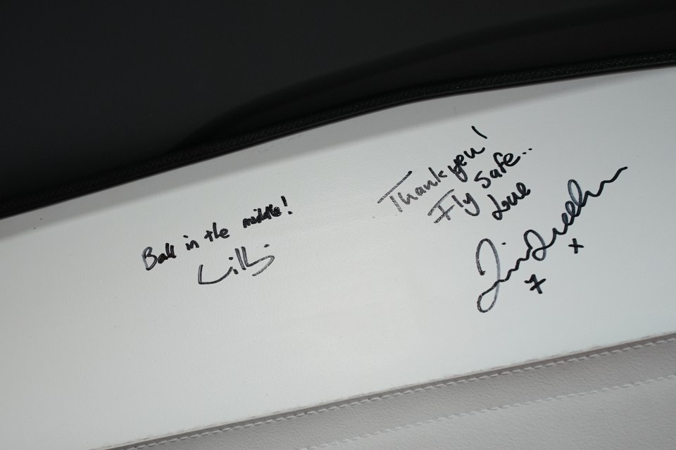 a white piece of paper with the words " bali in the middle " and " thank you fly safe " written on it