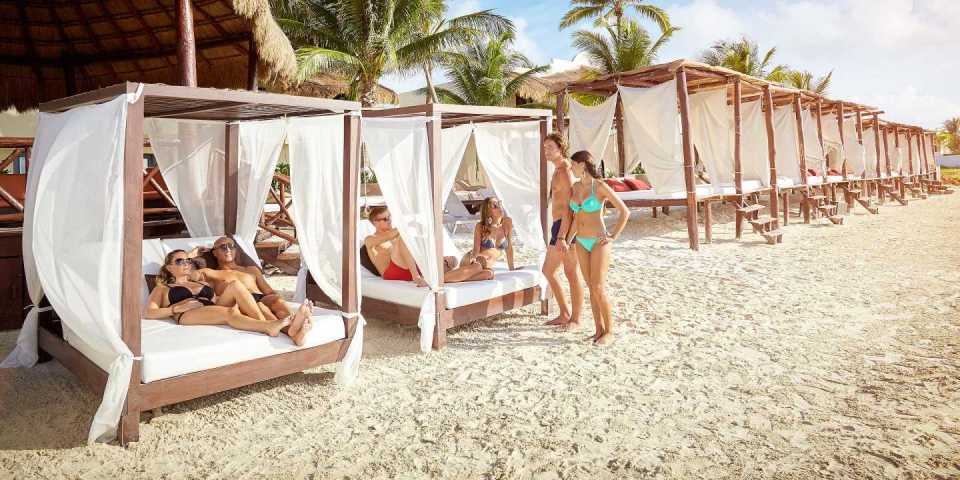 The luxurious sunbeds on the beach at Desire