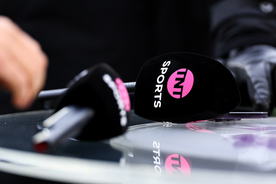 a pair of tnt sports microphones on a table