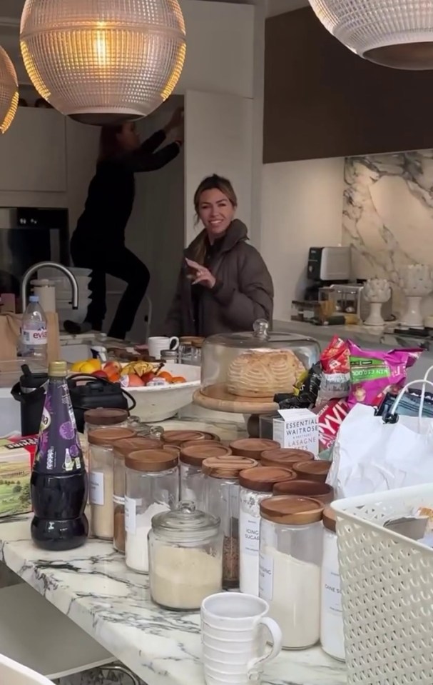 She shared behind-the-scenes clips of the messy kitchen in her Surrey mansion