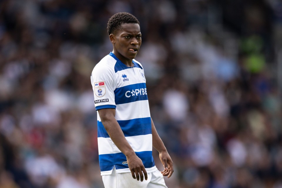 a soccer player wearing a blue and white capire jersey