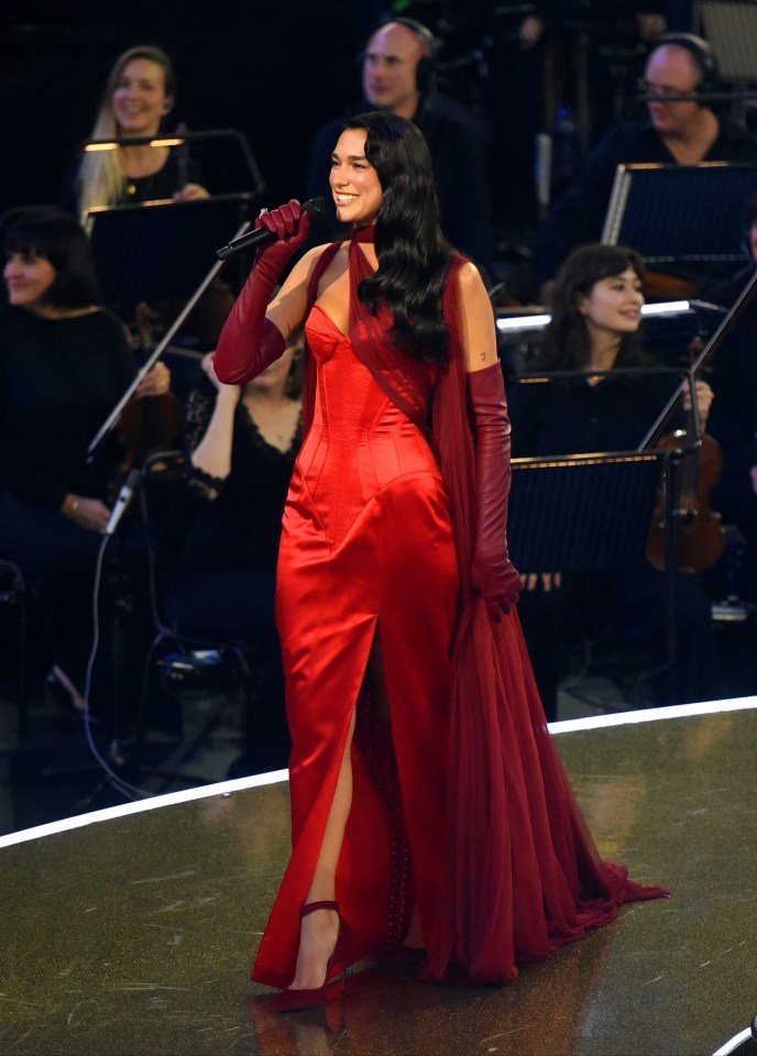 Dua Lipa put on a breathtaking performance in this red Jean Paul Gaultier dress