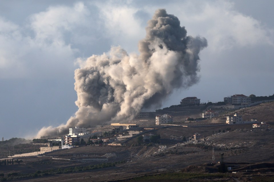 Smoke rises as a result of an Israeli airstrike near Maroun El Ras village in southern Lebanon