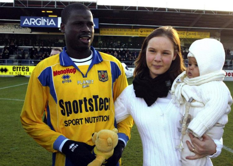 a man wearing a yellow jersey that says sports tec