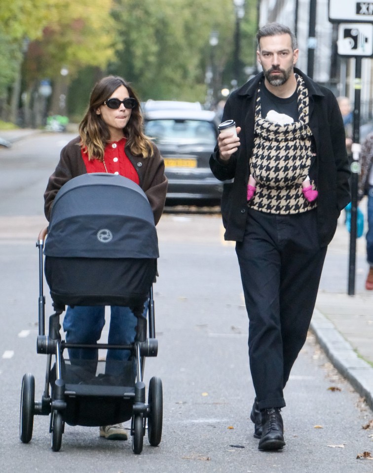 She was pictured walking in London with the baby and partner Jamie Childs