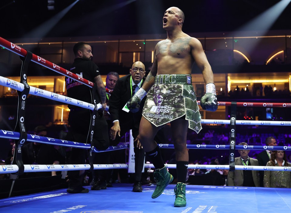 a man in a boxing ring with the word mfc on his shorts