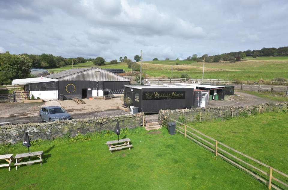 a building with a sign that says westley woods