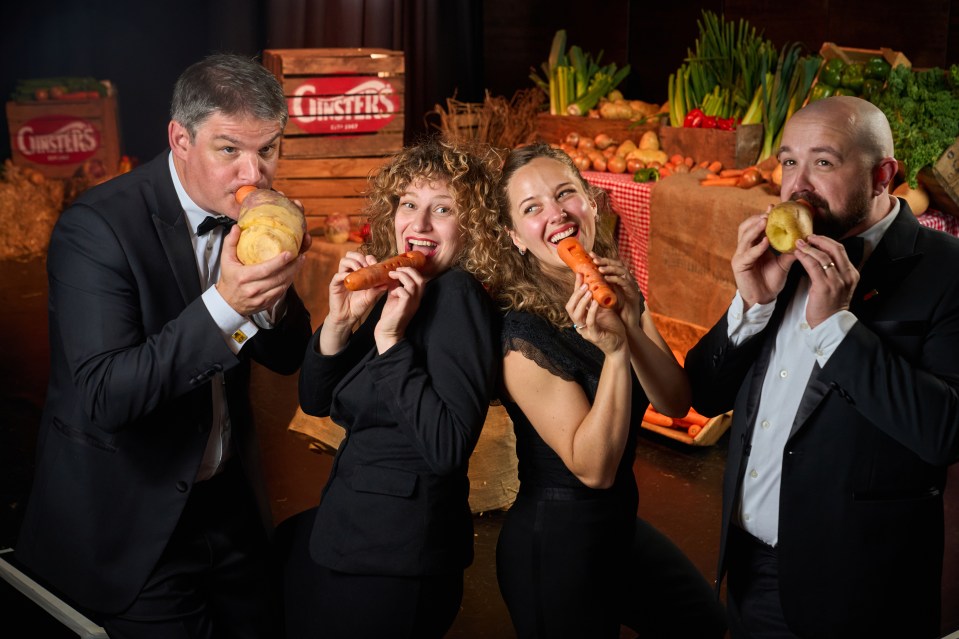 three people eating carrots in front of a sign that says christies