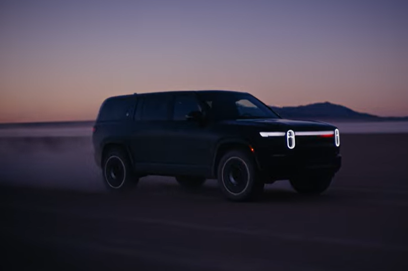 a black suv with the number 8 on the front