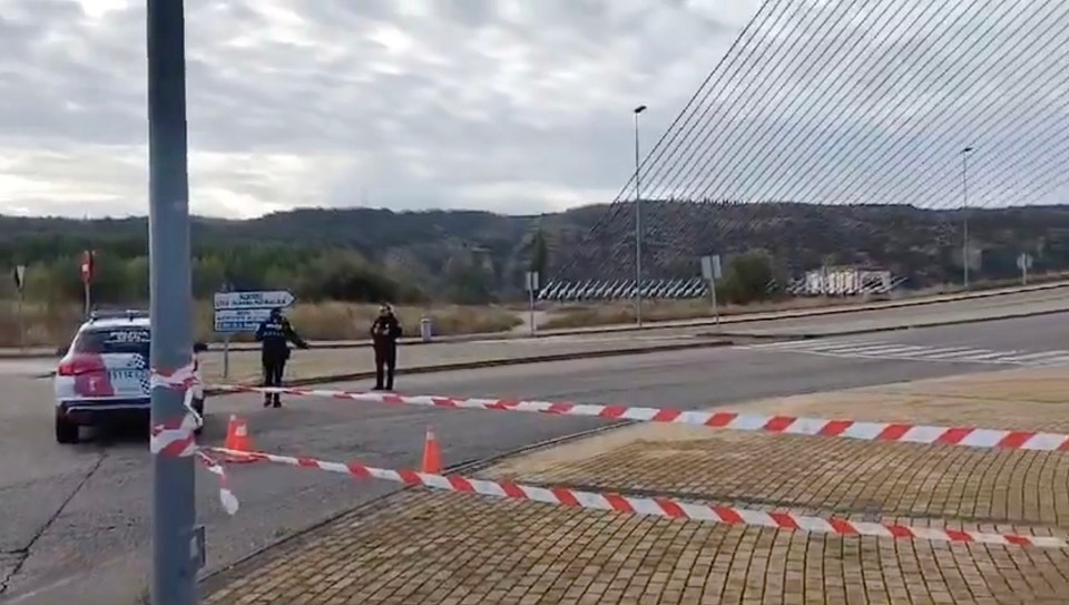 a police car is parked on the side of the road