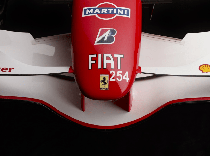 a red and white race car with the word fiat on it