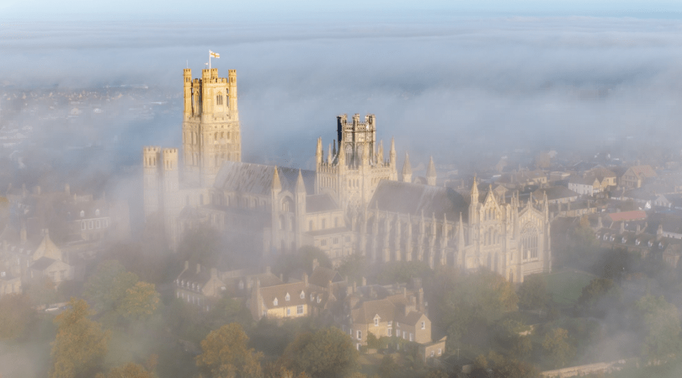 Ely Cathedral in Cambridgeshire shrouded in early morning mist