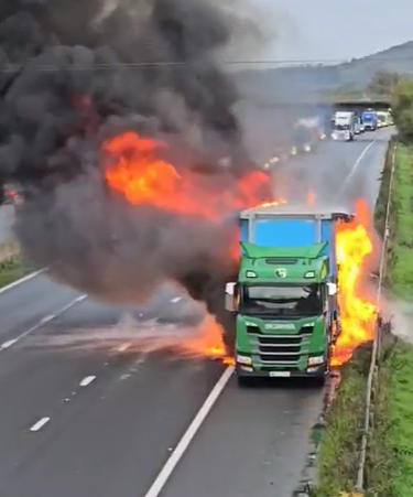 Smoke billowed into the air as bright orange flames erupted