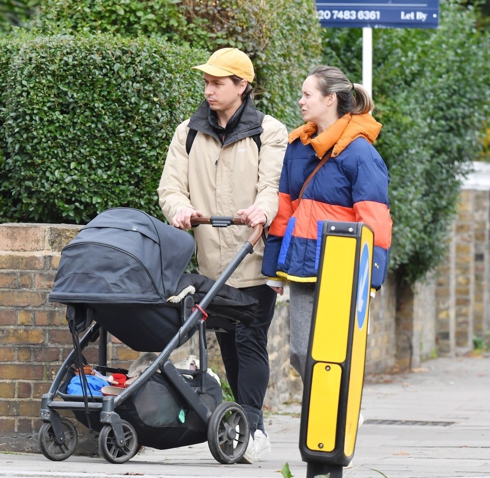 The couple looked in high spirits during the family stroll