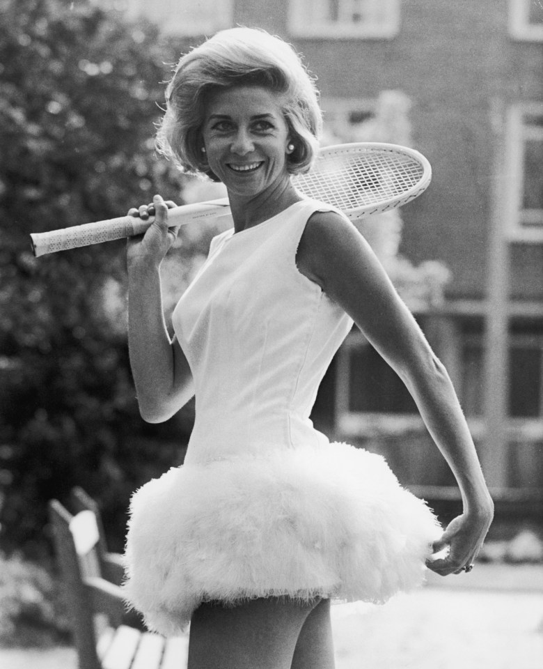 She's pictured wearing a tennis dress trimmed with feathers in 1964