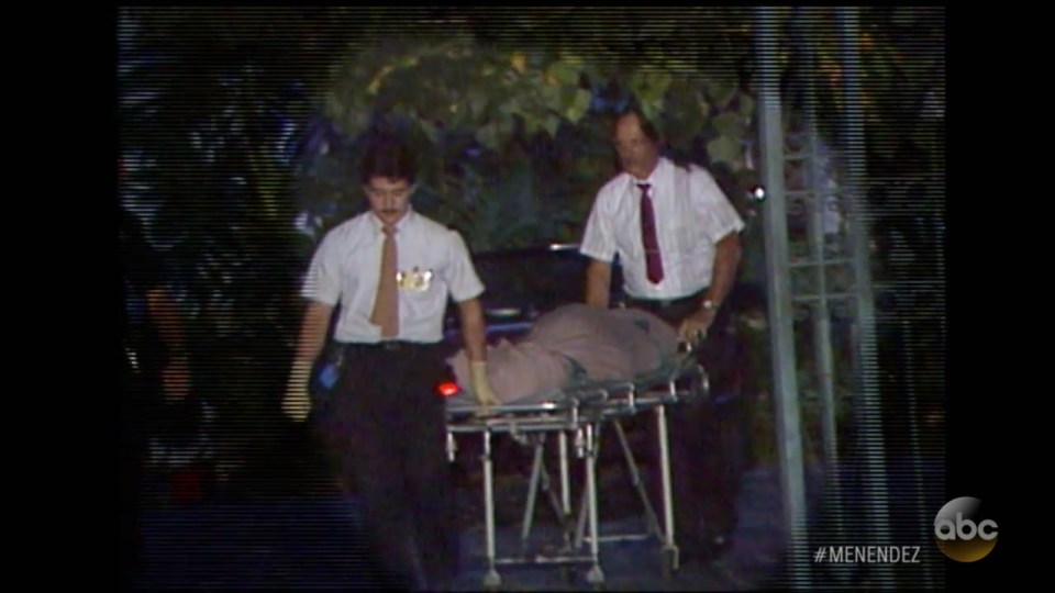 two men carrying a stretcher with the abc logo on the bottom