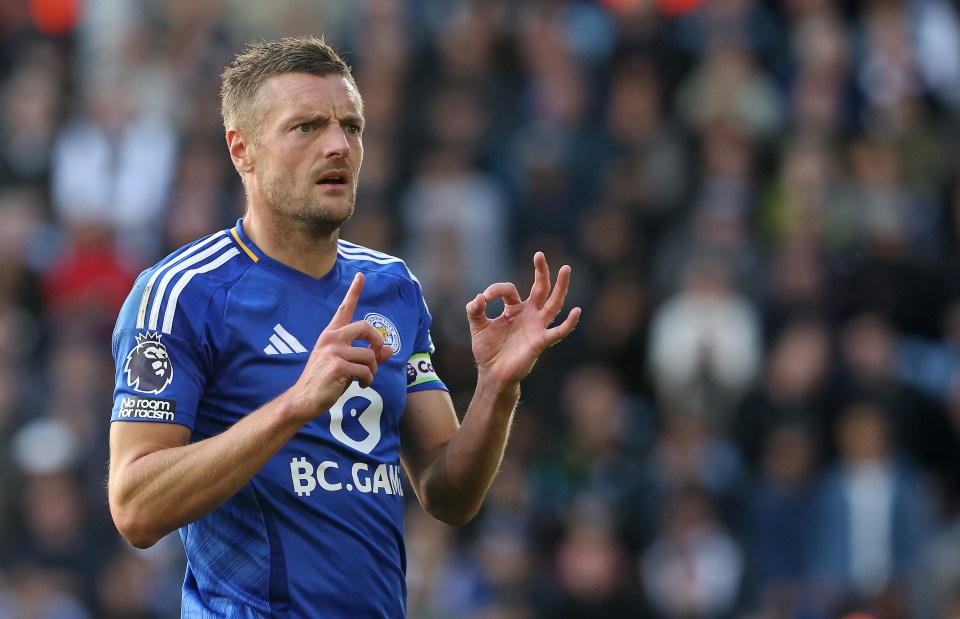 a soccer player wearing a blue jersey that says bc.gan