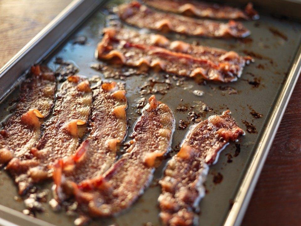 a tray of bacon is sitting on a table