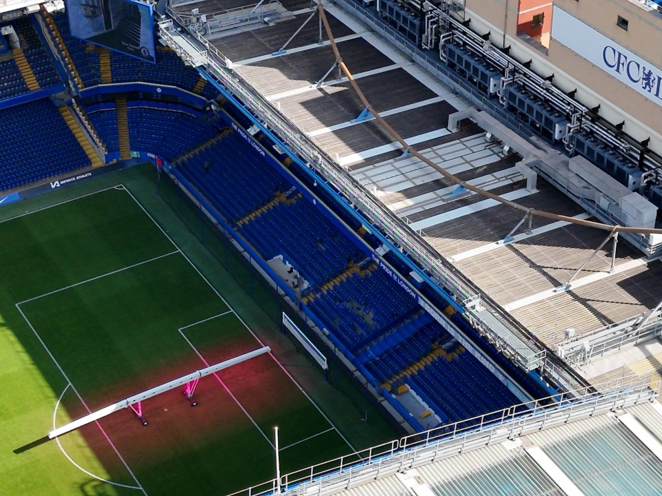 an aerial view of a soccer field with a sign that says ' chelsea ' on it