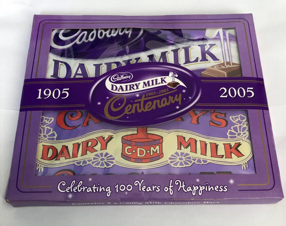 a box of cadbury dairy milk celebrating 100 years of happiness