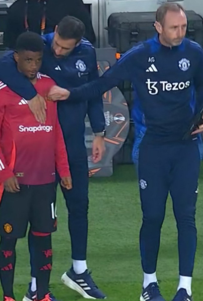 Amad looked visibly disappointed as Ruud van Nistelrooy attempted to encourage him on the touchline