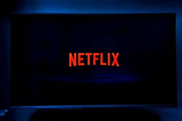 a netflix logo is displayed on a television screen