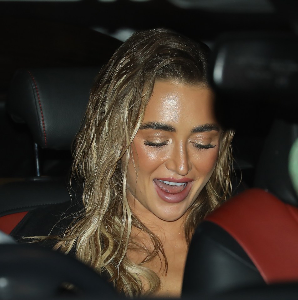 Georgia Harrison was beaming as she got in the car home