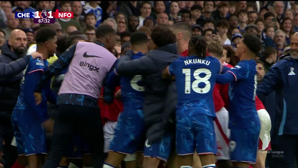 a group of soccer players with one wearing the number 18