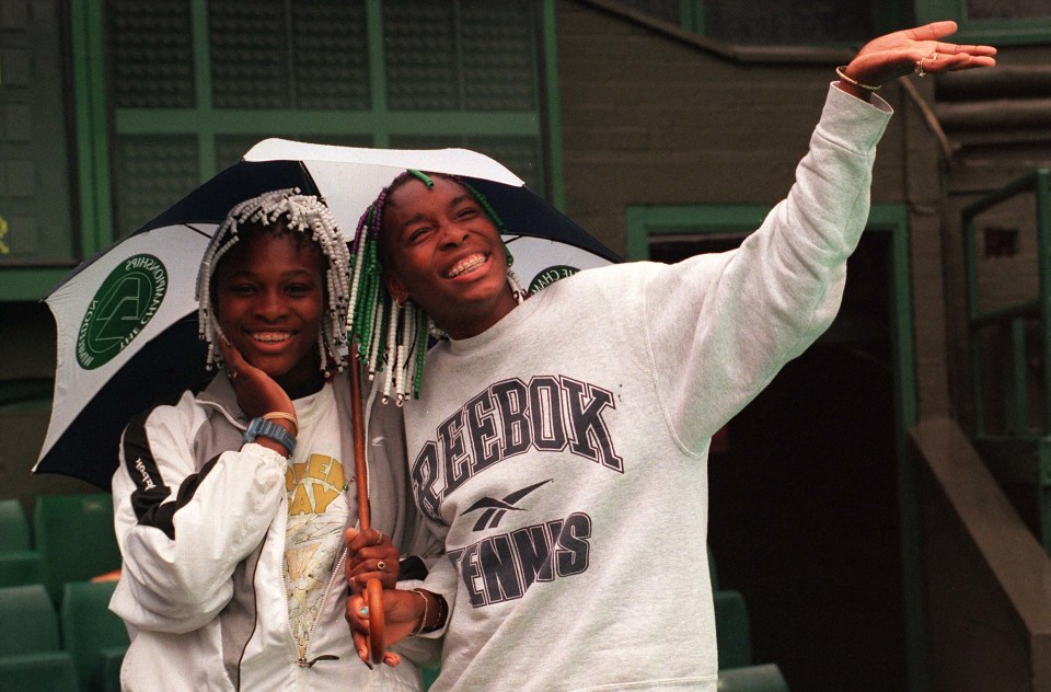 Venus, pictured with sister Serena, played in her first Wimbledon in 1997