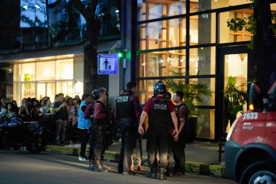 Police pictured outside the hotel