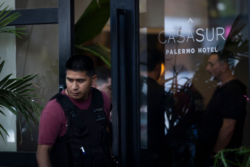 a man stands in front of a casasur palermo hotel