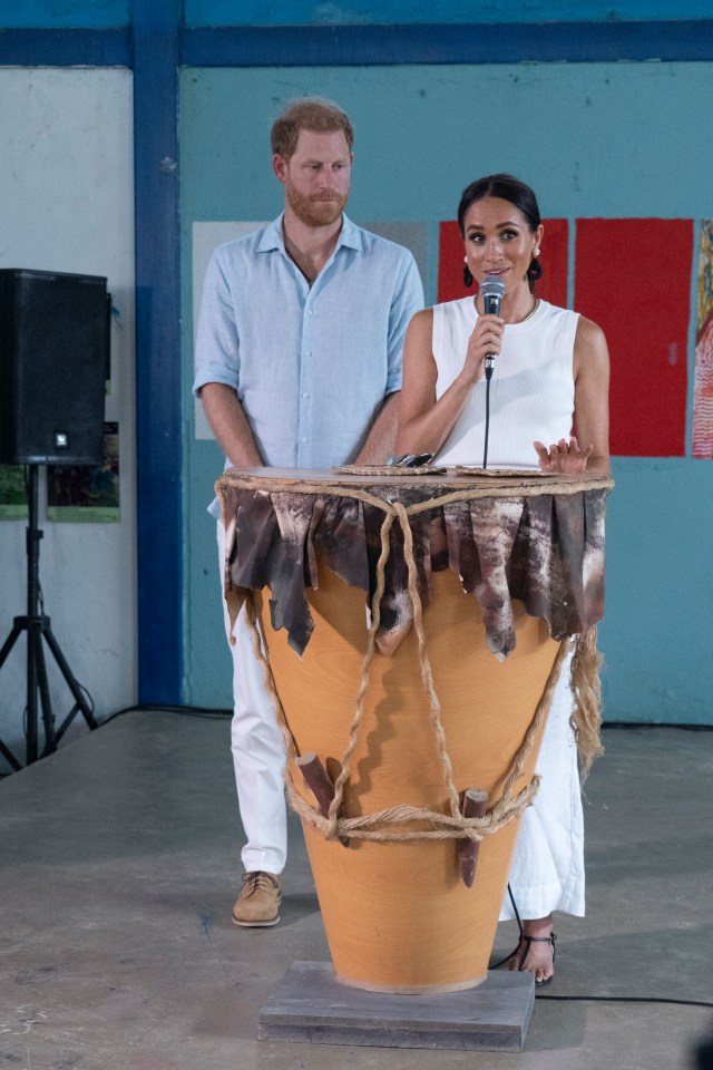 The Prince looking tense during Meghan's San Basilio de Palenque speech in August